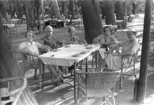 Eleanor Lattimore, older man and three women sitting at table