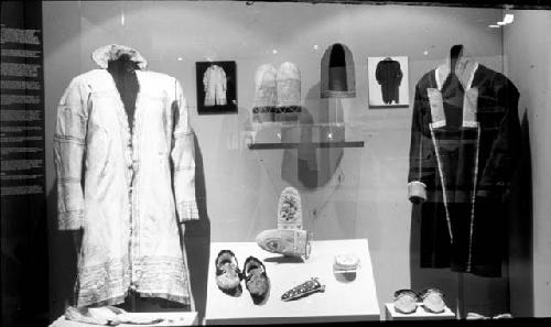 Exhibit case containing clothing