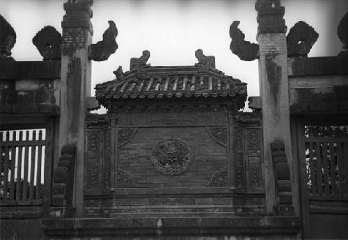 Ornate carved gateway in ornate wall