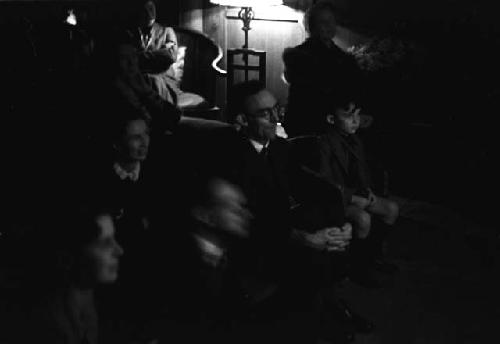 Audience, watching shadow puppets, including David Lattimore