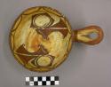 Ladle, Polacca polychrome style c. int: zuni rain bird design; ext: slipped