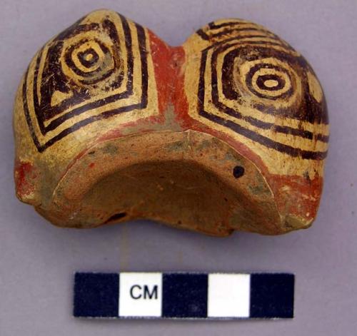Ceramic figurine whistle fragment, double-lobed
