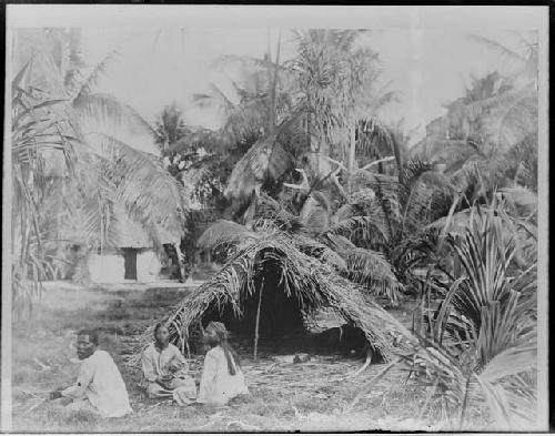 Children in front of hut