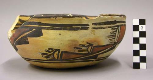 Bowl, polacca polychrome style c. int: zuni rain bird design; ext: linear design