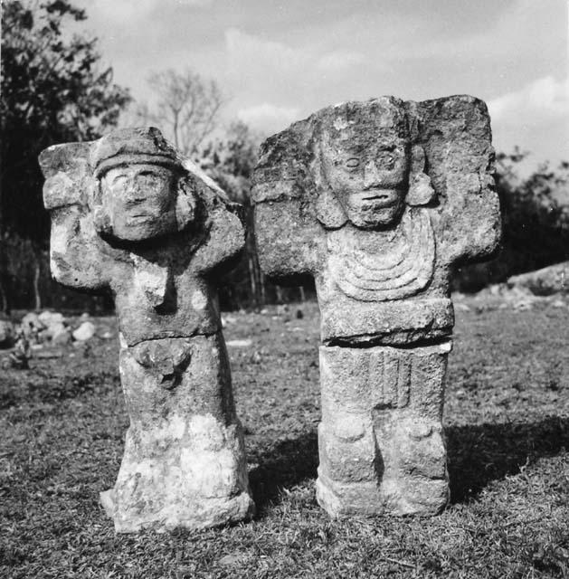 Atlanteans: left figure is 60 cm. tall, the right one is 61 cm ...