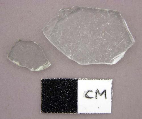 Glass, flat, clear fragments, small