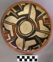 Bowl, polacca polychrome style c. int: linear design; ext: slipped, no design. 7