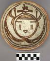 Bowl, polacca polychrome style c. int: kachina design; ext: slipped, no design.