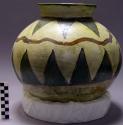 Ceramic jar with rounded base and images of snakes