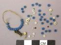 Glass beads, red, white, dark blue & light blue w/ remnants of sinew thread