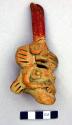 Ceramic figurine whistle, female anthropomorph
