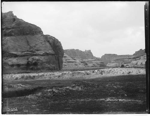 Canon de Chelly, looking up near Muerto -- pictograph caves near left middle