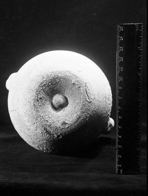 View of bottom of pottery cinerary urn