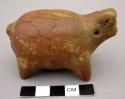 Pottery whistle - red animal figure, head broken