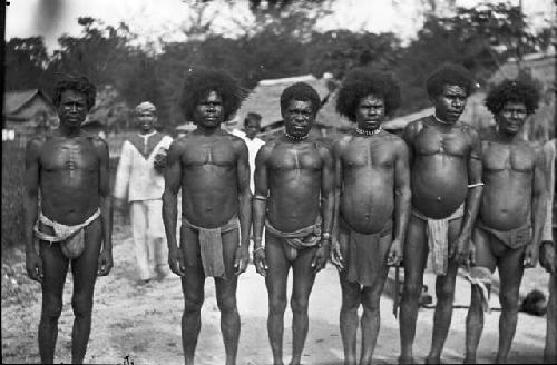 Group of men in village