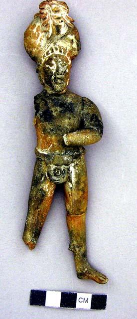 Jaina standing male figurine with an elaborate headdress