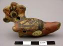 Ceramic figurine whistle of bird? with crest