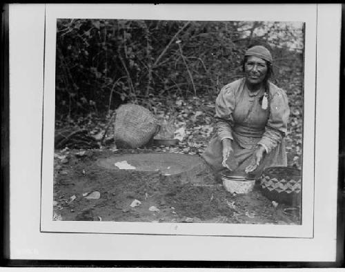 Woman Soaking Acorn Meal