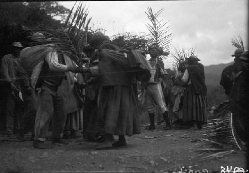 Dance including masked man in costume