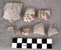 Ceramic sherds, body sherds, red designs on white exterior