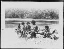 Five men in boat on water