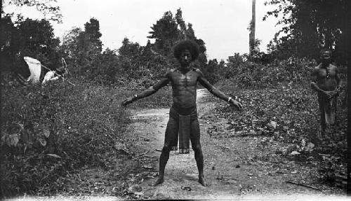 Man standing in road