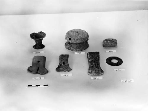 Bronze drum, situla, bronze axe heads, ring of jade-like stone, clay net sinkers