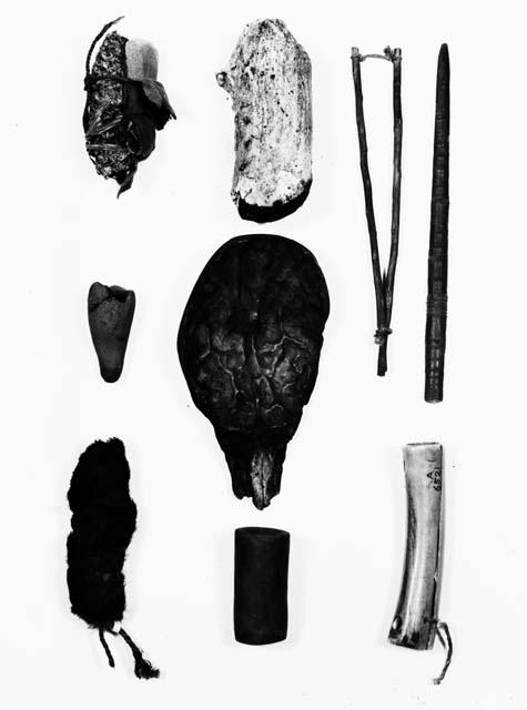 Wooden, clay and bone objects and rabbit's foot