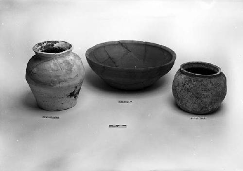 White ware pear-shaped urn, large shallow orange ware bowl, and small urn