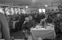 Soldiers sitting together in banquet room