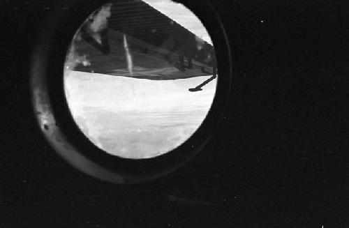 Plane's wing through window