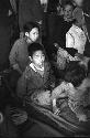 Potrait of children sitting on the floor