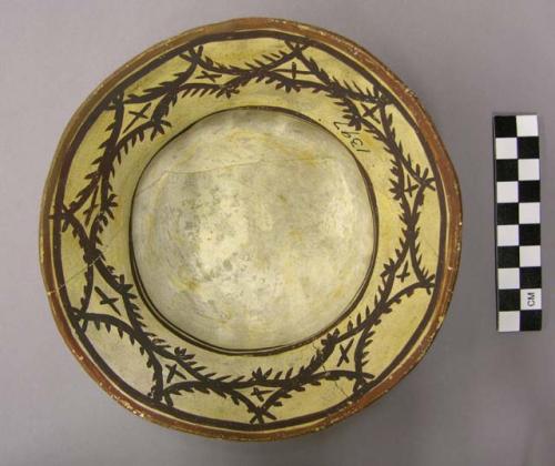 Bowl, polacca polychrome style c. int: curvilinear; ext: slipped, no design. 6.7