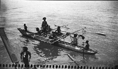 Men in canoe on river