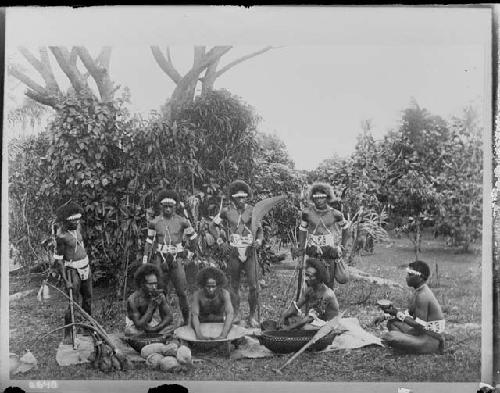 Men in native dress with tools