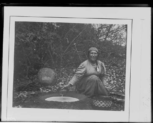 Woman Soaking Acorn Meal