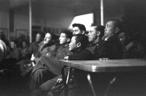 Audience watching boxing match