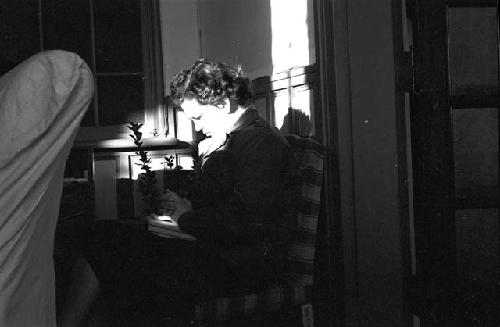 Woman sitting in chair during meeting