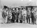 Group portrait of people wearing masks