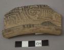 Pottery fragment with incised exterior design