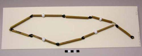 Necklace of reeds and bustle thoraxes