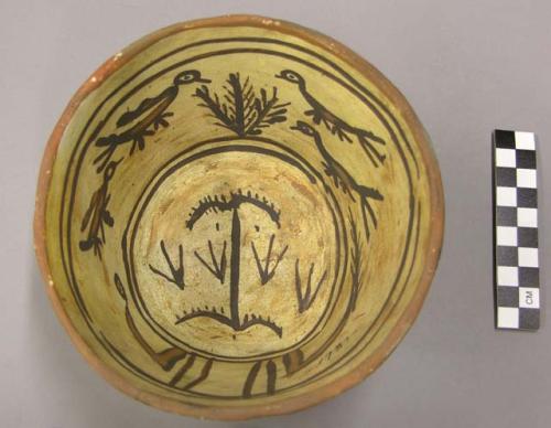 Bowl, polacca polychrome style c. int: clown design; ext: slipped, no design. 10