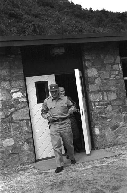 Portrait of soldier walking out of office