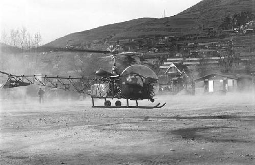 Chopper on ground lifting off