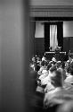 Portrait of half of auditorium during speech