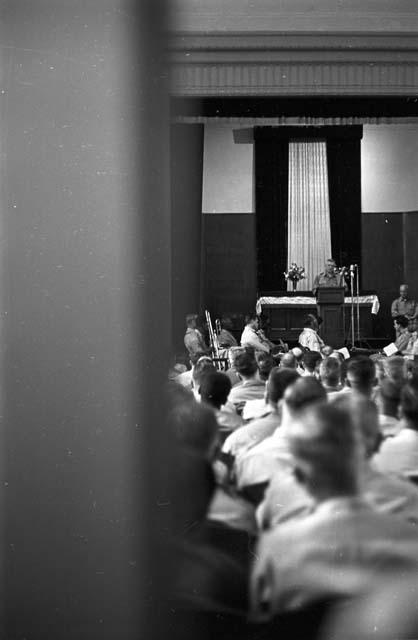 Portrait of half of auditorium during speech