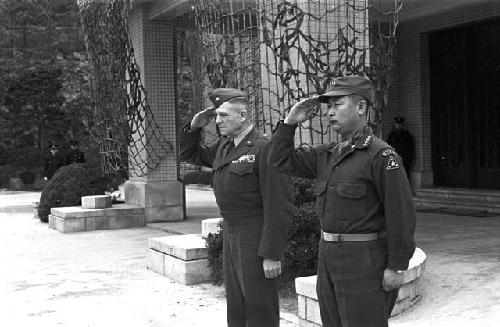 Korean and American salute side by side