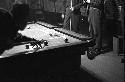 Soldiers in recreational room playing pool 3