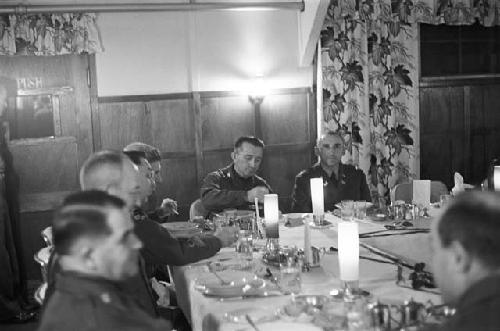 Portrait of soldiers eating dinner