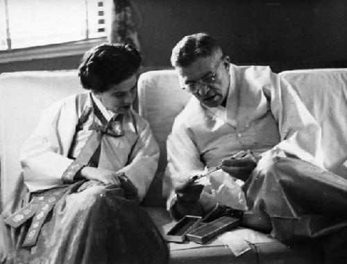 Lieutenant Martha Voyles and General Whitcomb looking at object, Christmas Day,